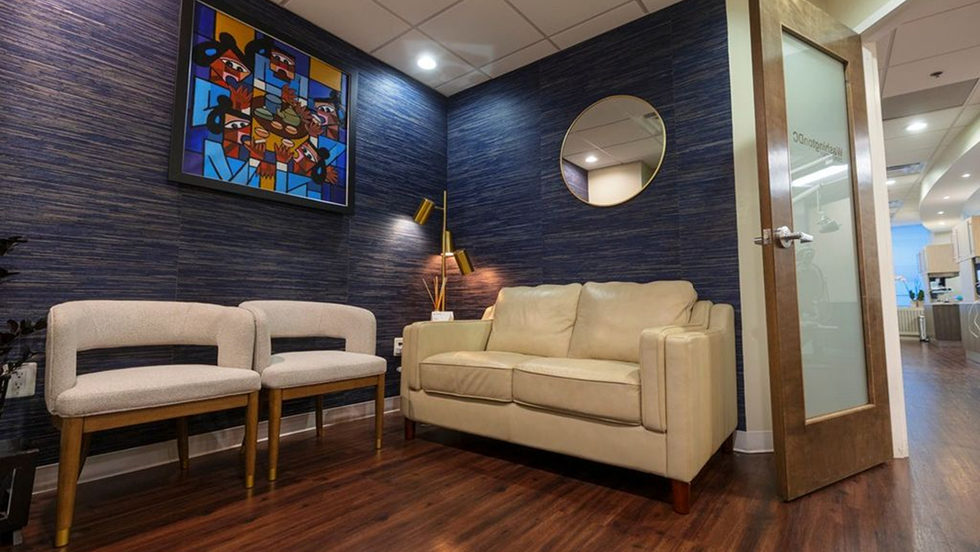 Off-white loveseat in the reception area